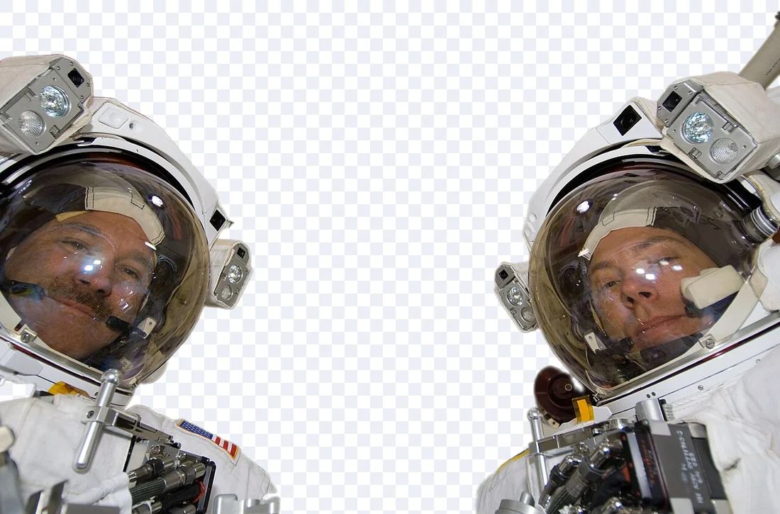 The same two astronauts with the spacecraft and sky removed, keeping fine helmet and suit edges.